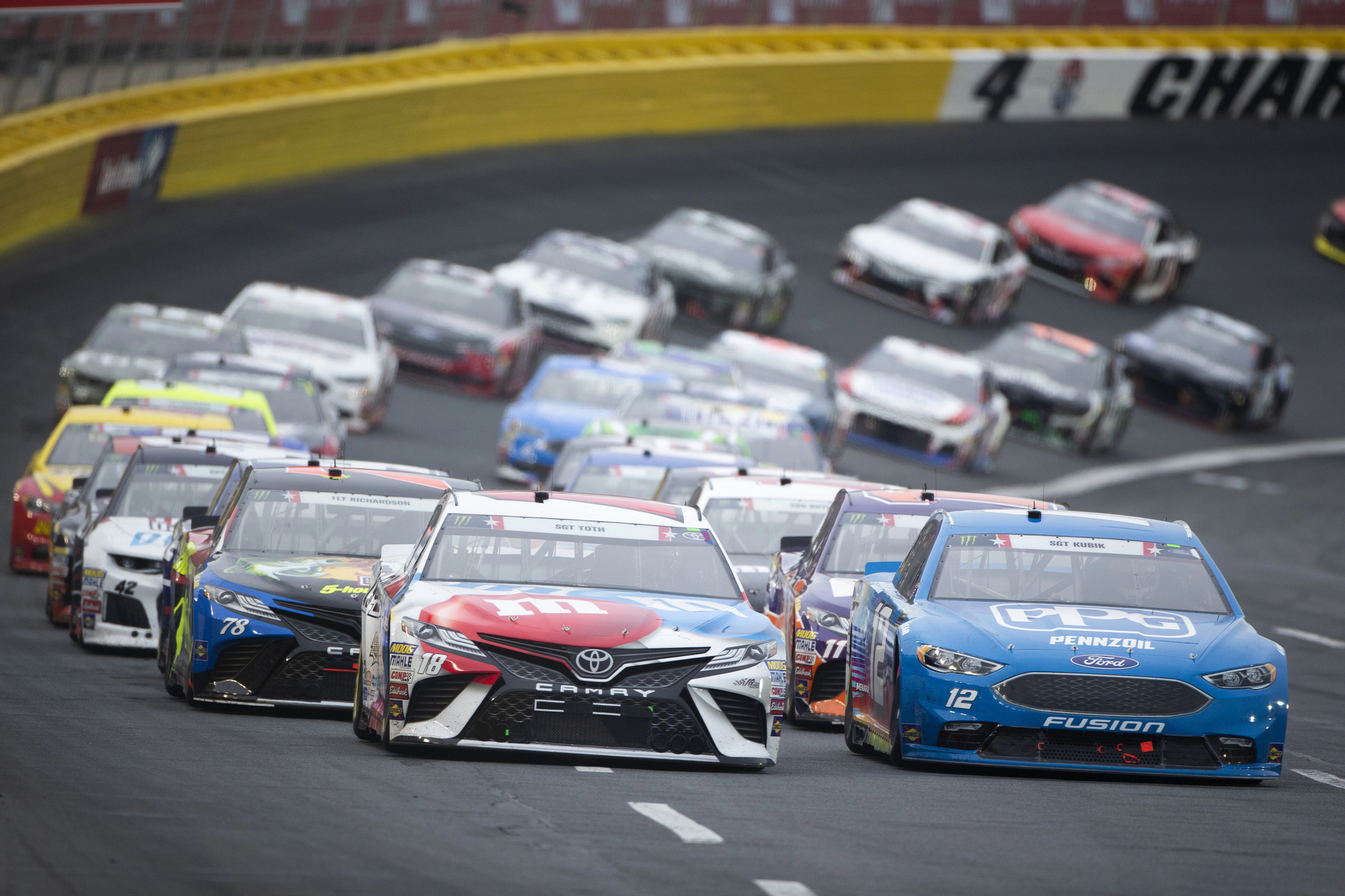 Kyle Busch (18) races down the front stretch during the Coca-Cola 600 at Charlotte Motor Speedway in Concord, North Carolina (Photo by actionsports/Deposit Photo)