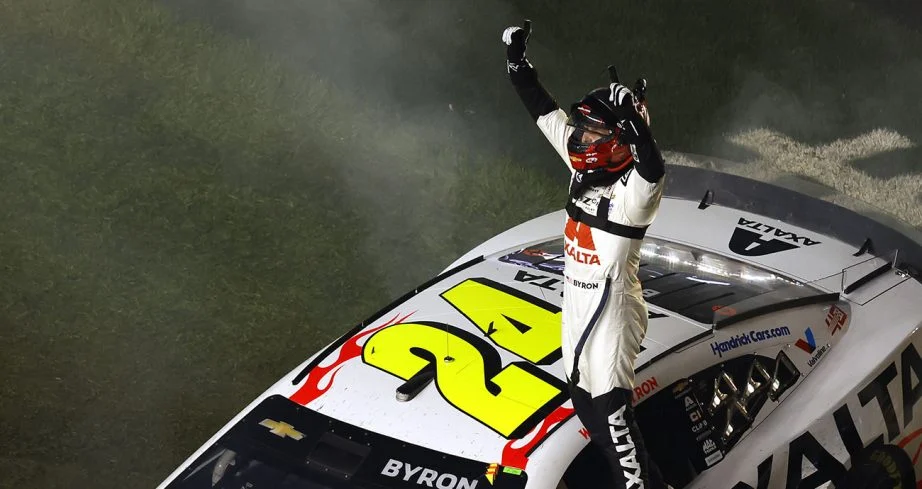 William Byron, driver of the No. 24 Axalta Chevrolet, celebrates after winning the NASCAR Cup Series Daytona 500 at Daytona International Speedway.