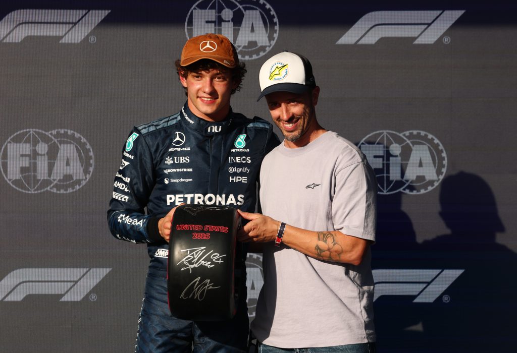 AUSTIN, TEXAS - OCTOBER 24: Pole position qualifier Andrea Kimi Antonelli of Italy and Mercedes AMG Petronas F1 Team receives his Pirelli Pole Position award from Andrea Dovizioso during qualifying ahead of the F1 Grand Prix of United States at Circuit of The Americas on October 24, 2026 in Austin, Texas. (Photo by Sam Bloxham/LAT Images)